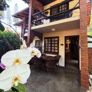 Casa pé na areia em condomínio com piscina