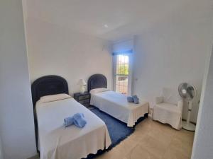 Beachfront 2 BD Apartment & Private Garden