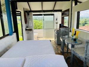 Finca Hotel San Cipriano Quimbaya Habitaciones y Cabañas