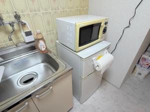 101コーポ月見ヶ丘 208