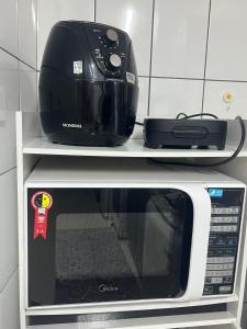 Apto Tombo Guarujá lindo 2dorm 2 banh pé na areia com elevador promoção