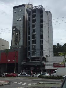 Quarto sala cozinha Praia do Canto Localização excelente na opinião 100 por cento dos hóspedes