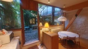 Charmant appartement en rez-de-chaussée avec patio arboré !