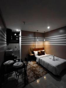 Cozy Room in Taguig with 1 Bedroom and Kitchenette