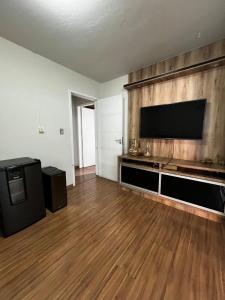 Casa com churrasqueira e ar para até 8 pessoas