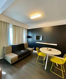 Flat aconchego no hotel Merc Privilege