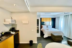 Flat aconchego no hotel Merc Privilege