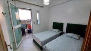 Appartement 3 avec piscines, vue mer et accès à la plage à Achakar Hill, Tanger