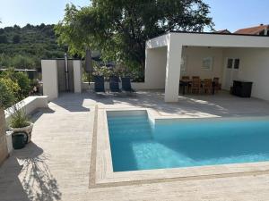 Holiday home in Murter with swimming pool