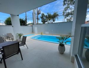 Apto Ubatuba 200mt da praia com sacada gourmet