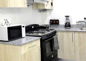 Comfy & Secure Modern 2BR Apartment just 5 minutes from Airport in Boca Chica