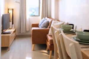 Cozy Japandi 2BR Condo Family Staycation with WIFI by Casa Luntian at The Leaf Residences