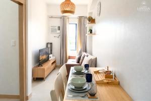 Cozy Japandi 2BR Condo Family Staycation with WIFI by Casa Luntian at The Leaf Residences