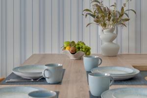 DOKI Living - Apartments & Foodhall by Downtown Apartments