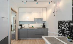 Bedroom Apartments Hołdu Pruskiego 1 m3 z garażem przy Parku