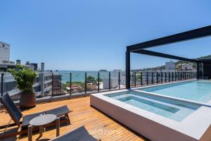 Estúdios em Condo. c Piscina a 150m da Praia em Jurerê - PTE