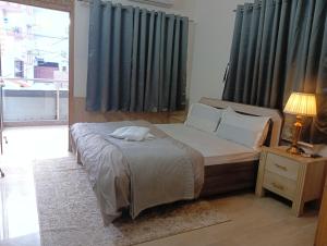 Ima Sadhana Hotel - Aesthetic Sunlit Rooms in Upper Tapovan With Free Airport Pickup for bookings more than 7 nights