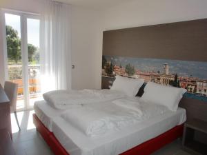 Residence Rivachiara (check-in at Hotel Riviera in Viale Rovereto, 95)