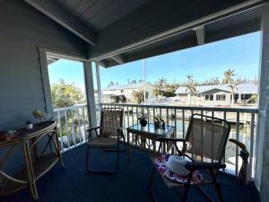 Spot manatees from your balcony