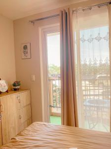 Condo at Ground Floor with Private Balcony and FREE Pool Access