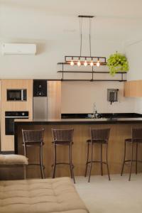 Casa Lumina Loft Moderno com Piscina e Painel LED