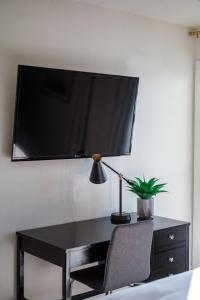 Upscale Lakefront Condo at 2mm with Pools, Slip, and Main Channel Views