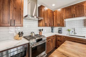 Experience the charm of Frisco in this spacious townhome, Decked Out Downtown, private hot tub