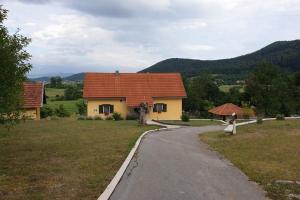 Holiday house with a swimming pool Otocac, Velebit - 25186