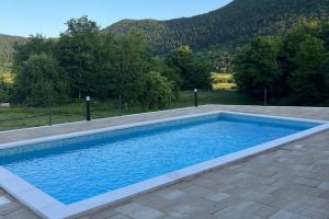 Holiday house with a swimming pool Otocac, Velebit - 25186
