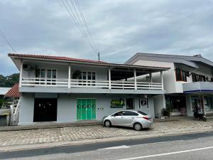 Casa com churrasqueira e ar para até 8 pessoas