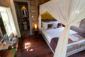 Deluxe room with pool view at Ubud