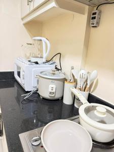 DBleu Suite near Mall of Asia by Forever-mc Condotel