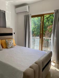 Olivo Apartment - Pool, AC, and close to Bonita