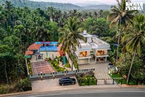 StayVista at Lagoons Kuruva with Shared Pool, Lawn