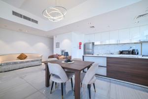 Quickstay holiday homes spacious and bright Balcony Breeze 01 bhk O2 Tower