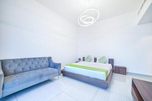 Quickstay holiday homes spacious and bright Balcony Breeze 01 bhk O2 Tower