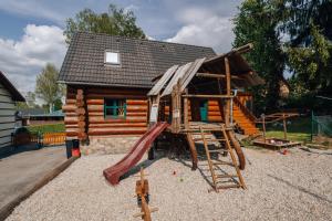 Srubové apartmány Rak