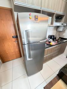 Santorini com 2 quartos Ao lado do hospital Mater Dei! Piscina grande e jacuzzi quentinha!