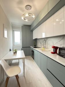 Q Deluxe Collection - Palas Commercial Center