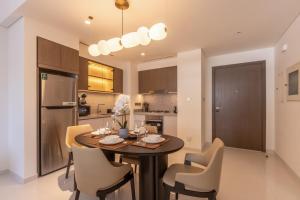 Designer 1BR at Emaar Beachfront with Beach Access