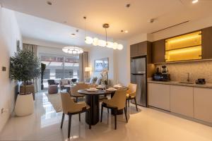 Designer 1BR at Emaar Beachfront with Beach Access