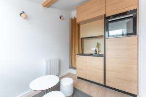 Le Petit Canut - T1 sous les toits avec vue