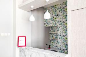 RedDoorz Syariah near GOR Satria Area