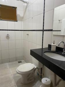 Casa espaçosa com área gourmet e churrasqueira