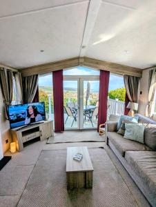 Helmsley Lodge sited on the Swanage Coastal Park with uninterrupted panoramic sea views