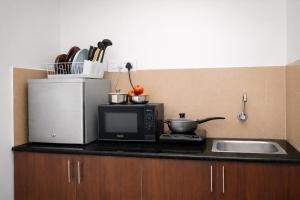 Hop Inn Service Apartment Hotel