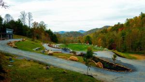 Romantic Glamping Under the Trees with Hot Tub Stargazing and Fire Pit Nights in Waynesville, North Carolina