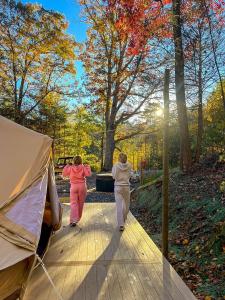 Romantic Glamping Under the Trees with Hot Tub Stargazing and Fire Pit Nights in Waynesville, North Carolina