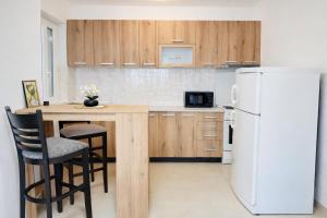 Family Nest - Two-Bedroom Apartment in City Centre by He-Ra Apartments Skopje