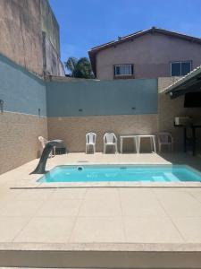 Casa com Piscina Privativa Churrasqueira Ar condicionado
